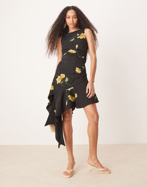 ASOS DESIGN - Robe mi-longue asymétrique à fleurs avec ourlet à volants - Noir et jaune - view 1
