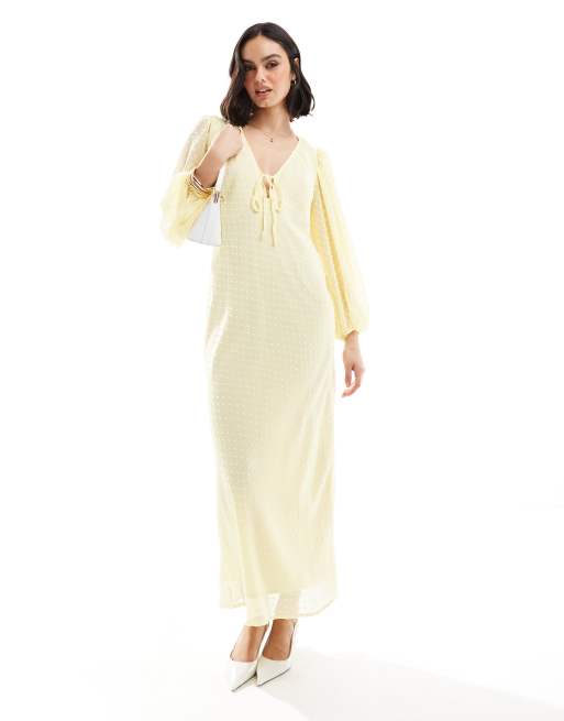 ASOS DESIGN - Robe mi-longue effet plumetis à manches ballon - Jaune