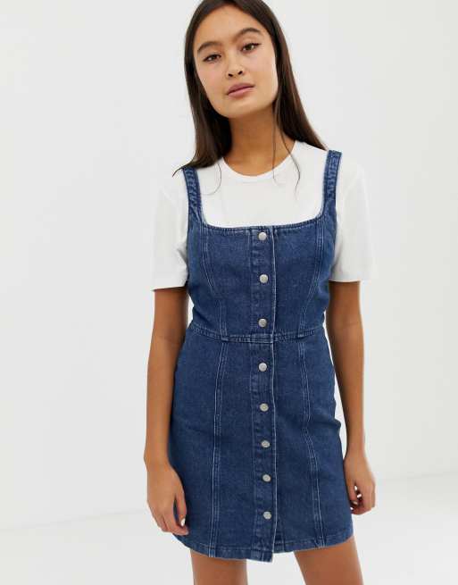 ASOS DESIGN - Robe moulante en jean avec boutons pression - Indigo