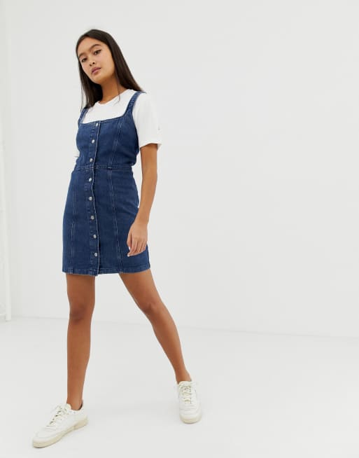 ASOS DESIGN - Robe moulante en jean avec boutons pression - Indigo