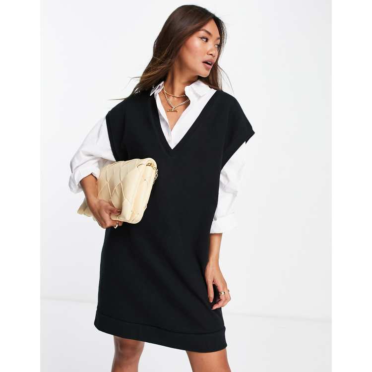 ASOS DESIGN Robe pull courte sans manches ultra douce avec col en V Noir