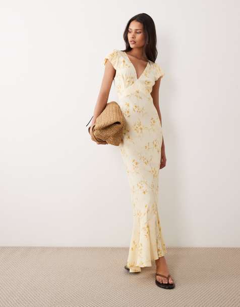 ASOS DESIGN - Robe rétro longue à fleurs avec manches bouffantes et col V - Jaune - view 1