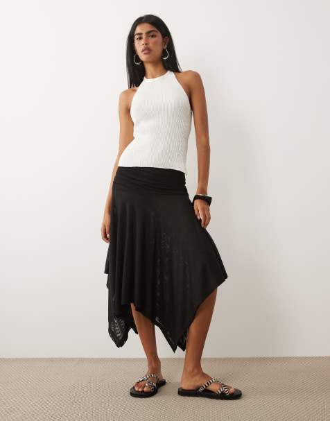 ASOS DESIGN – Rock aus transparentem Netzstoff in Schwarz mit Zipfelsaum, Kombiteil - view 1