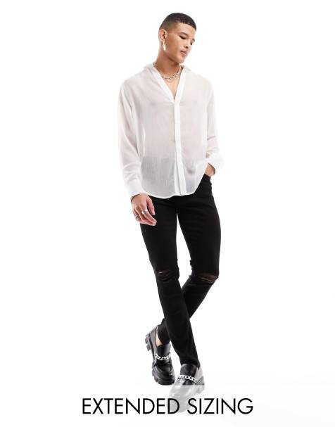 ASOS DESIGN – Röhrenjeans in Schwarz mit Knierissen - view 1