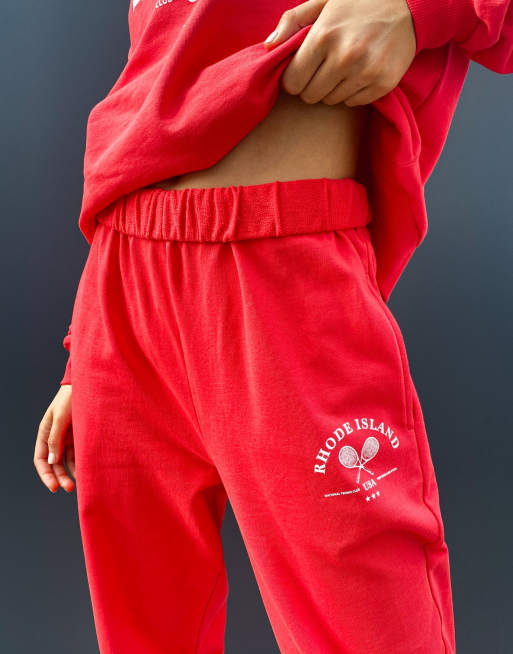 ASOS DESIGN roll waist oversized sweatpants with tennis logo in