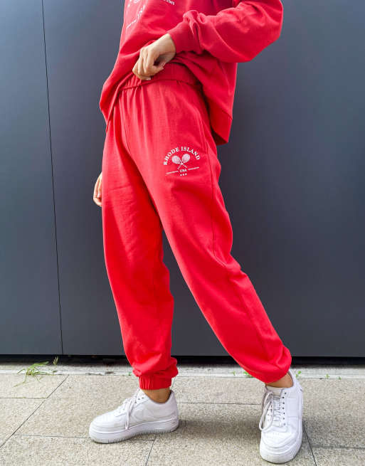 ASOS DESIGN roll waist oversized sweatpants with tennis logo in