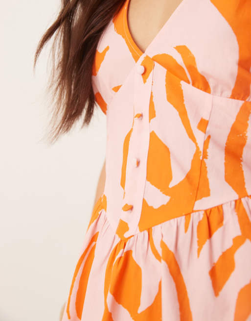 ASOS DESIGN – Rosa, abstrakt mönstrad miniklänning med v-ringning och indragen midja och knappar, 3 av 4