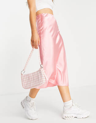 ASOS DESIGN – Rosa, diagonalskuren satinkjol i midilängd