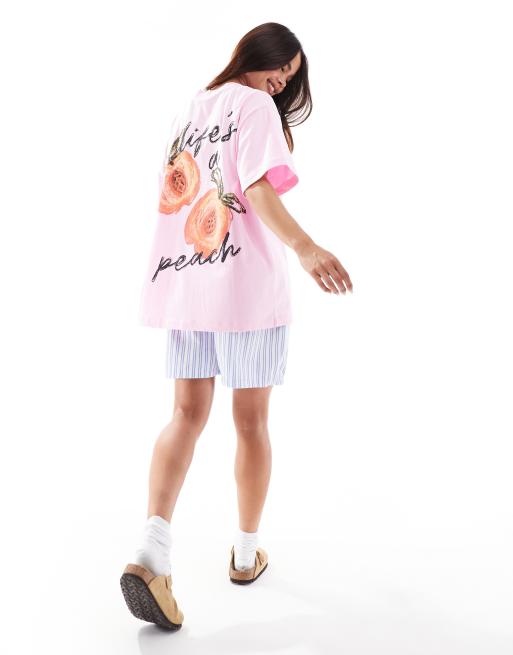 ASOS DESIGN – Rosa Oversize-T-Shirt mit Pfirsich-Grafik auf dem Rücken, 3 von 4