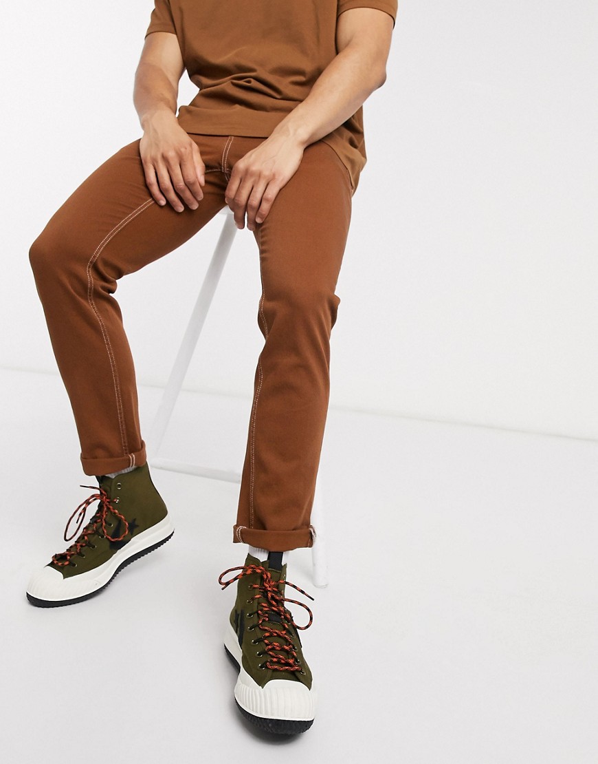 ASOS DESIGN – Rostfärgade slim jeans med stretch-Orange