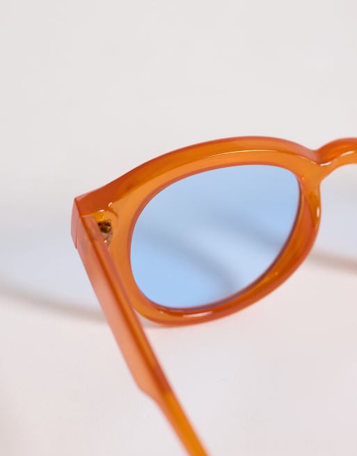 ASOS DESIGN round sunglasses in crystal orange frame with blue lens, 2 of 3
