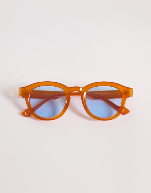ASOS DESIGN round sunglasses in crystal orange frame with blue lens, 3 of 3