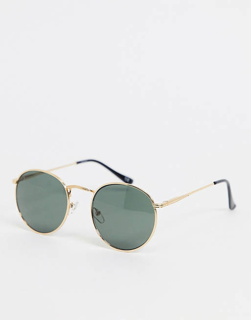 ASOS DESIGN round sunglasses in gold metal with smoke lens