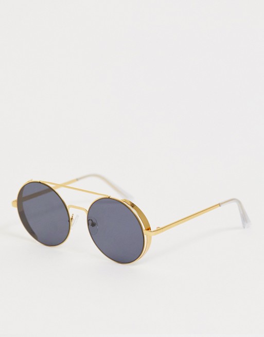 ASOS DESIGN round sunglasses in gold with brow detail and side capping and smoke lenses
