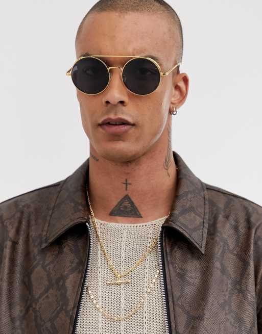 ASOS DESIGN round sunglasses in gold with brow detail and side capping and smoke lenses