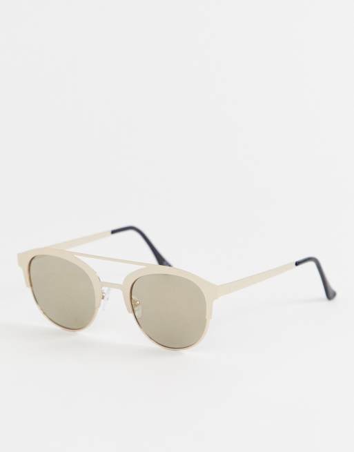 ASOS DESIGN round sunglasses in gold with gold flash lens & brow bar ASOS