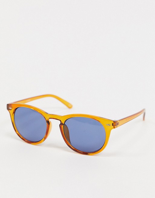 ASOS DESIGN round sunglasses in orange plastic with blue lens