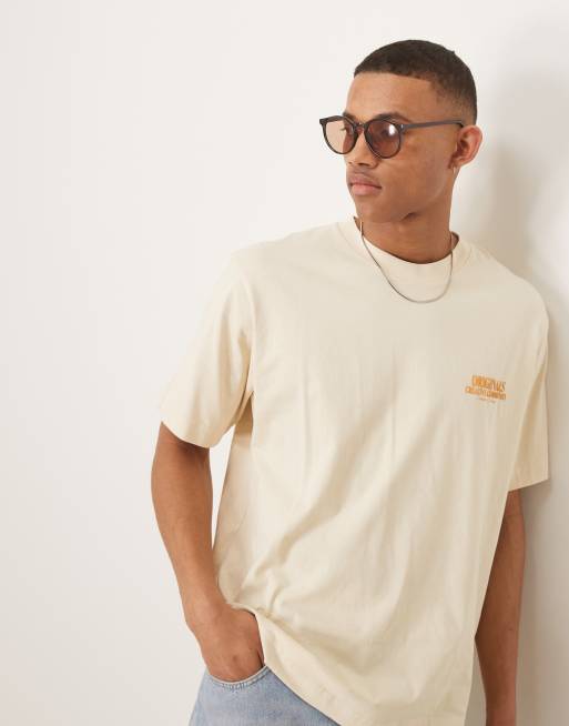 ASOS DESIGN round sunglasses with light brown lens and black crystal frame