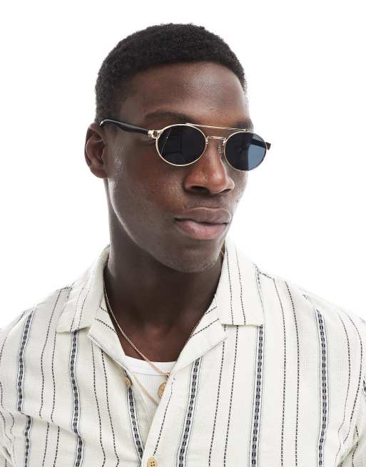 ASOS DESIGN round sunglasses with smoke lens and gold metal frame , 2 of 3