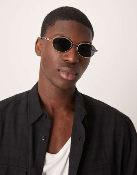 ASOS DESIGN round sunglasses with smoke lens and gold metal frame - view 1
