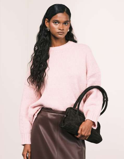 ASOS DESIGN oversized crew neck jumper with curved hem in pink