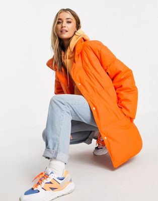 ASOS DESIGN rubberised oversized puffer jacket in orange