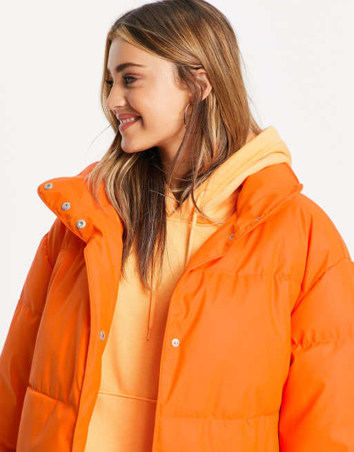 Orange puffer hot sale jacket women