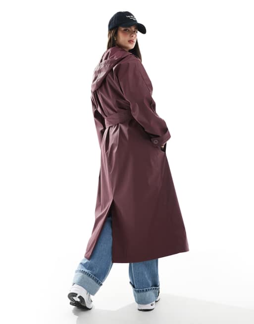 ASOS DESIGN rubberized rain hooded trench coat with belt detail in burgundy