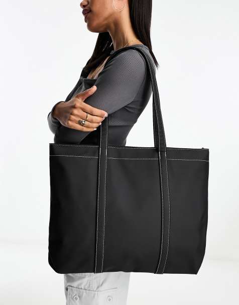 ASOS DESIGN rubberised showerproof tote bag with laptop compartment in black - view 1
