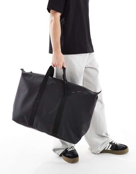 ASOS DESIGN rubberized carryall bag in black - view 1