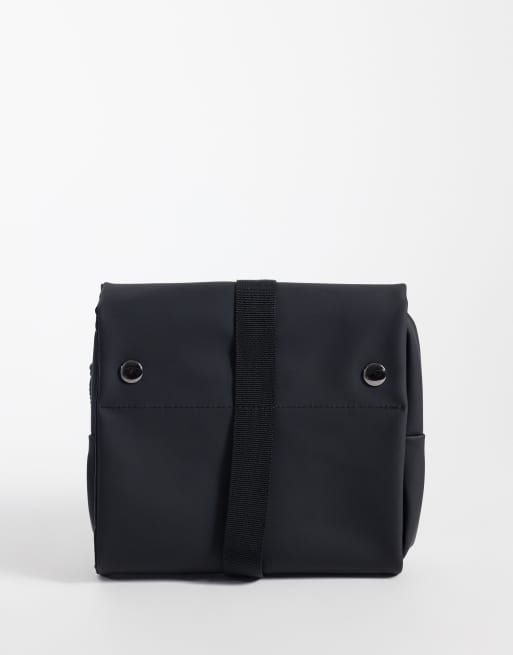 ASOS DESIGN rubberized foldover toiletries bag in black, 3 of 3