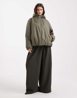 Asos Design Rubberized Hooded Rainwear Bomber Jacket In Green