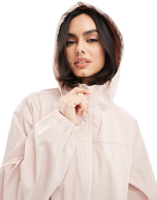 ASOS DESIGN rubberized rain coat in pale pink