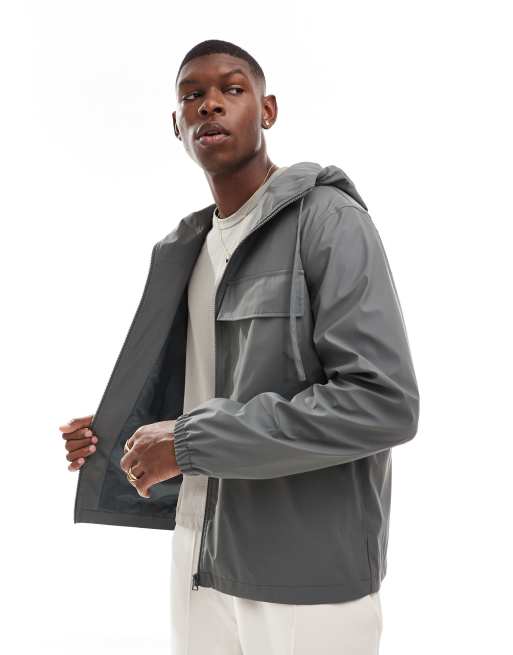 ASOS DESIGN rubberized rain jacket with chest pockets in charcoal