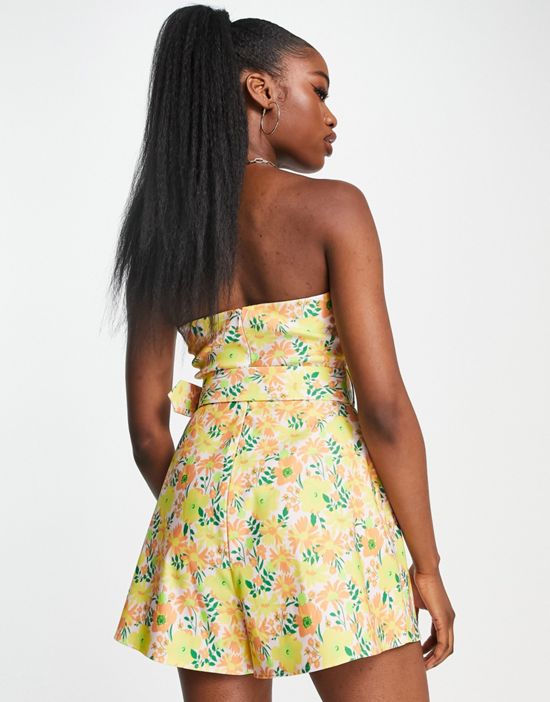 https://images.asos-media.com/products/asos-design-ruched-bandeau-romper-with-belt-in-floral-print/202448684-2?$n_550w$&wid=550&fit=constrain