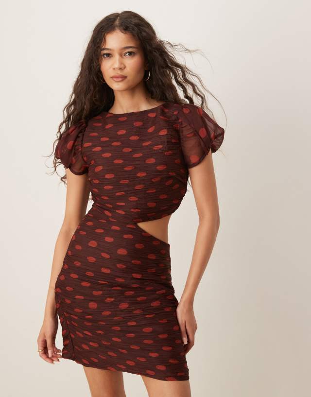 ASOS DESIGN ruched bodice cut out mini dress in spot print