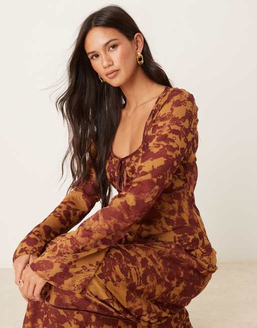 ASOS DESIGN ruched bust long sleeve maxi dress in orange abstract