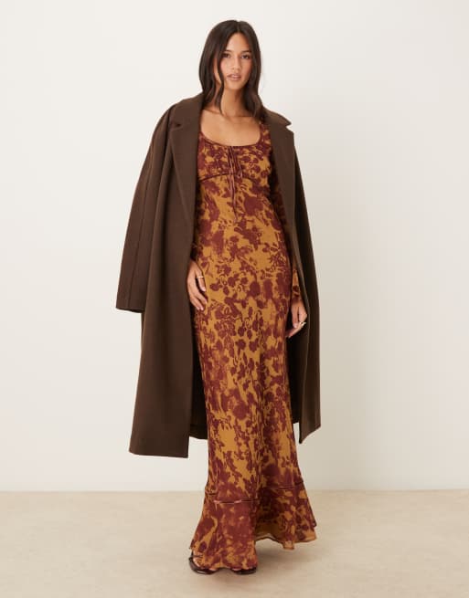 ASOS DESIGN ruched bust long sleeve maxi dress in orange abstract