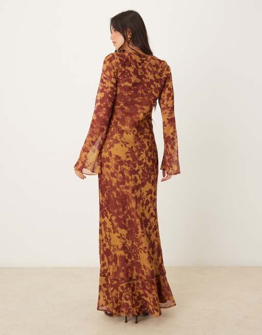 ASOS DESIGN ruched bust long sleeve maxi dress in orange abstract