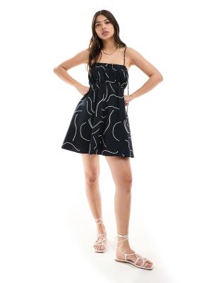 asos design ruched bust mini sundress with adjustable straps in mono abstract print