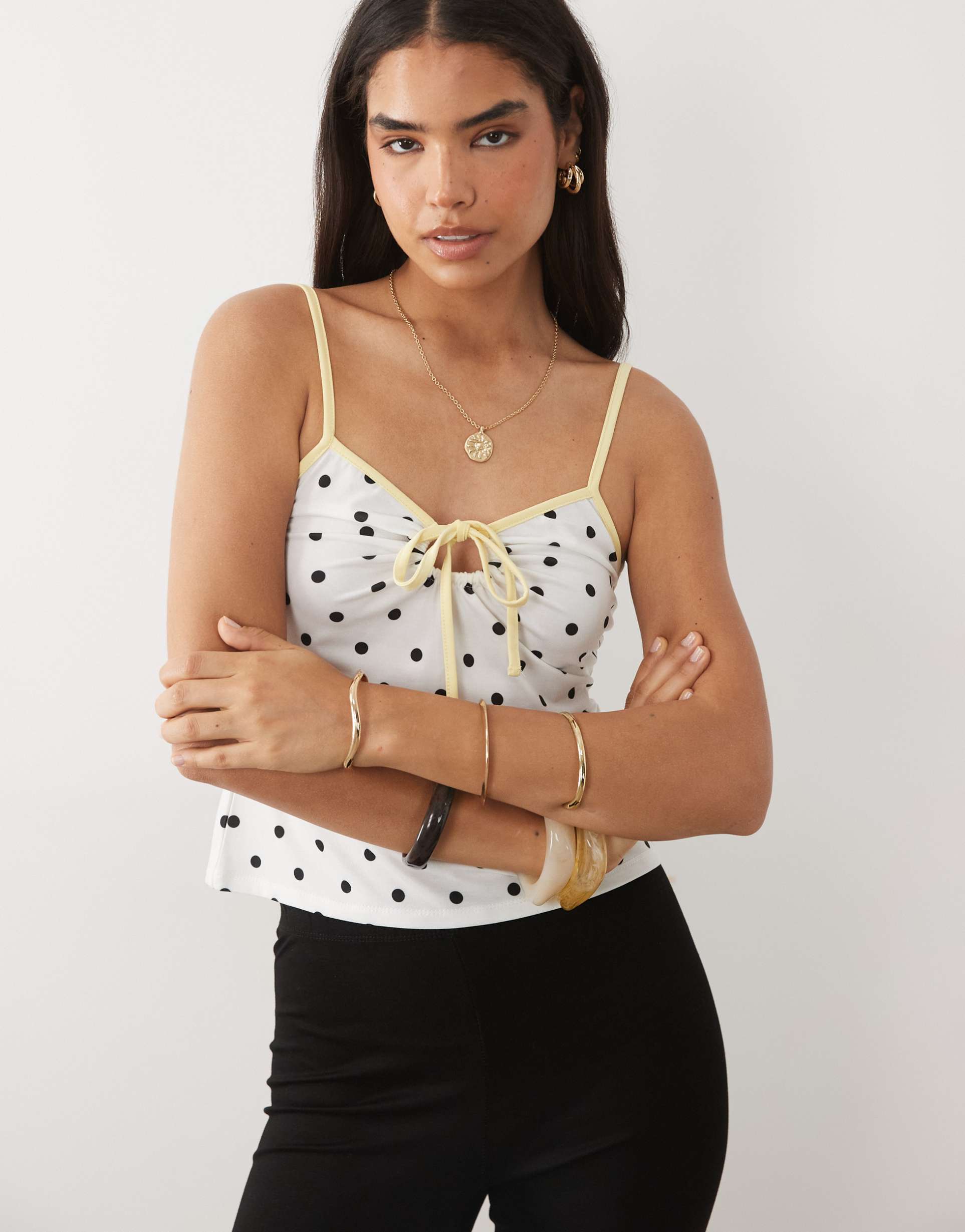 asos design ruched cami top with contrast tipping in mono polka dot print