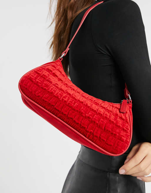 ASOS DESIGN ruched elongated 90s shoulder bag in red velvet