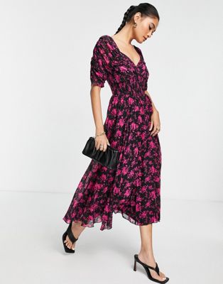 ASOS DESIGN ruched front pleated midi dress with shirred waist in in black based floral print
