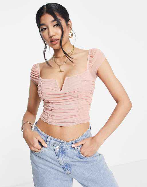 ASOS DESIGN ruched mesh crop top with v bar in blush pink