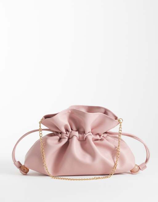ASOS DESIGN ruched resin ball pouch clutch bag with detachable shoulder strap in light pink, 4 of 4