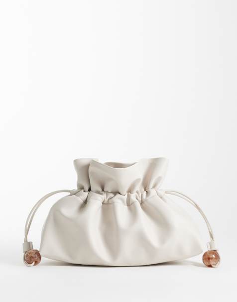 ASOS DESIGN ruched resin ball pouch clutch bag with detachable shoulder strap in stone - view 1