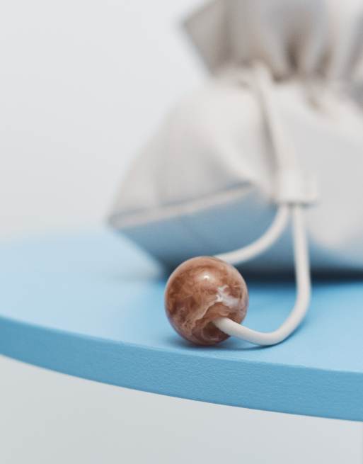 ASOS DESIGN ruched resin ball pouch clutch bag with detachable shoulder strap in stone, 2 of 8