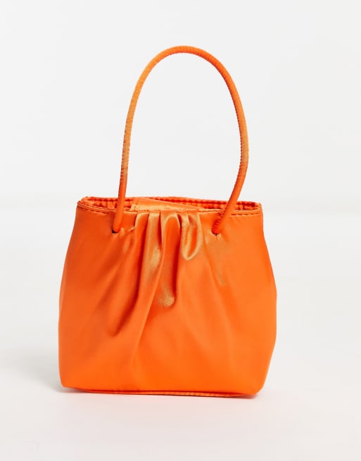 Orange clutch hotsell bag asos