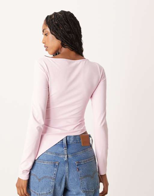 ASOS DESIGN ruched side asymmetric hem long sleeve top in pink
