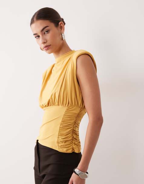 ASOS DESIGN ruched waist grown on neck shoulder pad top in ochre - view 1
